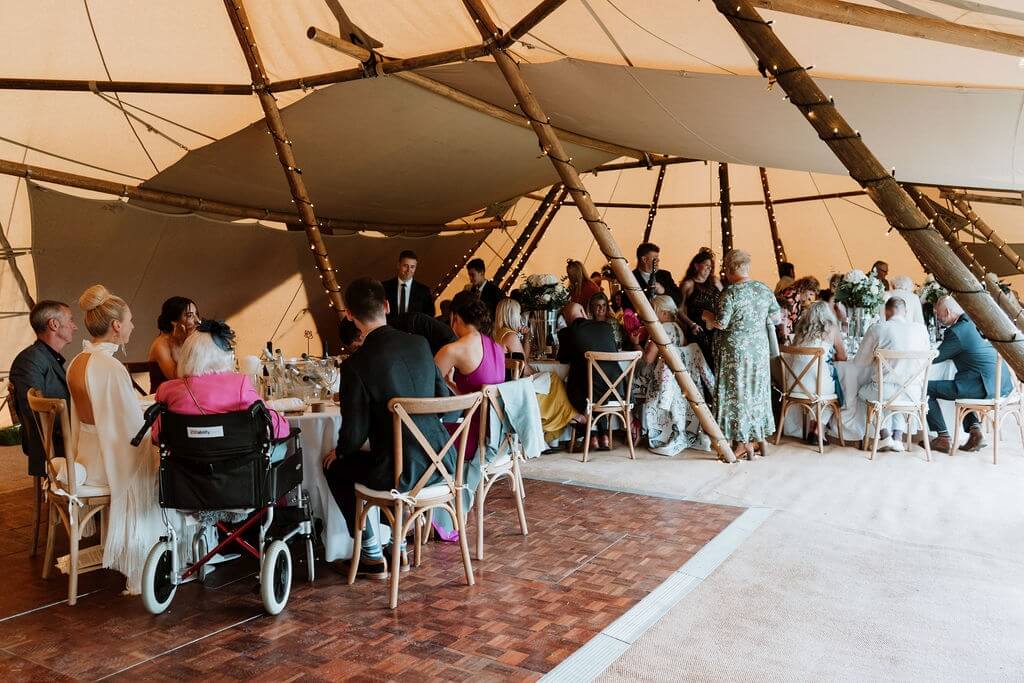 Wedding Guests In A Tipi