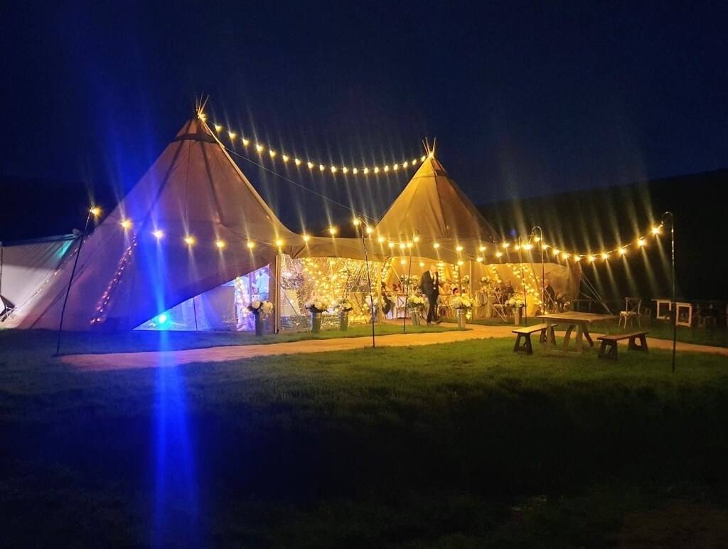 Tipi Setup For Wedding In The Evening